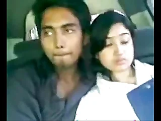 Indian Young man kissing Show one's age alongside car    xxxbd25.sextgem.com